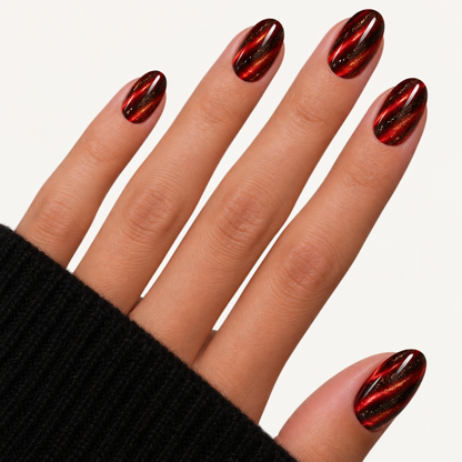 Manucure rouge noire effet cat eye